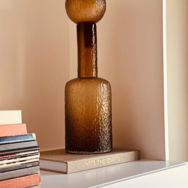 Brown vase with ball